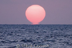Sunrise - proof that the sun is melting and heating up th... by Steve Laycock 